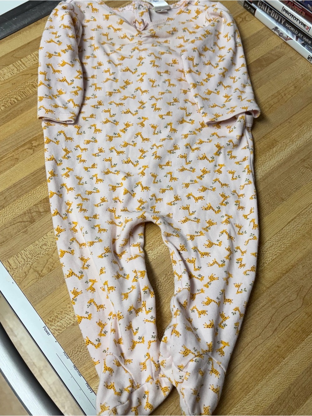 Old Navy Pink Footed One-Piece with Yellow Giraffe Print